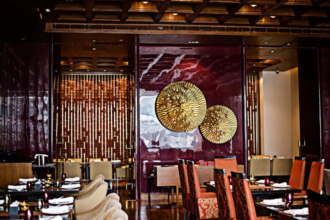 Taj City Centre Gurugram Gurgaon Esterno foto Interior of the restaurant